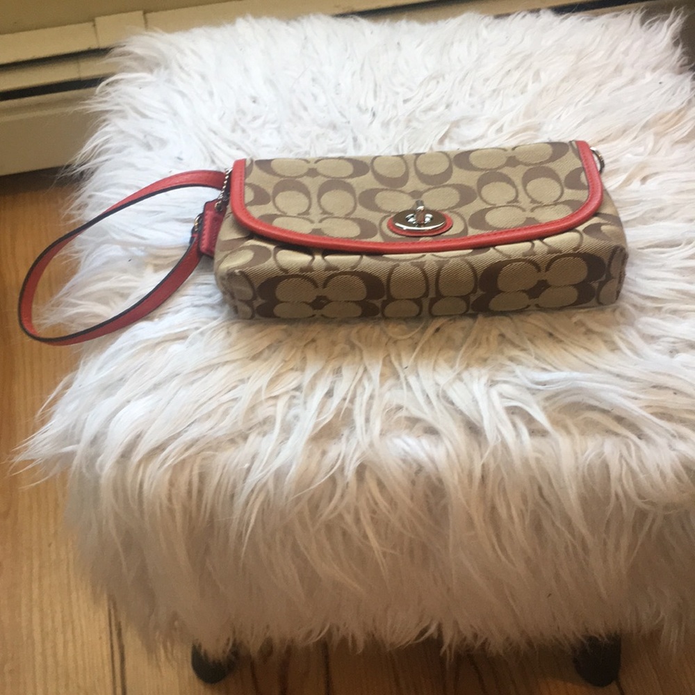 Large beige monogram wristlet